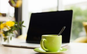 7laptop-green-ceramic-coffee-cup-work-desk