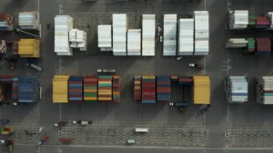 economy-container-in-port Tumpukan peti kemas produk export di pelabuhan Jakarta